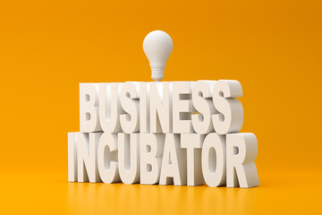 The word business incubator letterpress with a light bulb on yellow background. Business startup service support concept.