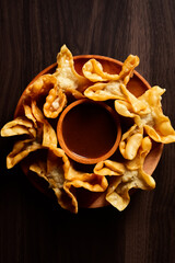 Fried dumplings with peanut sauce