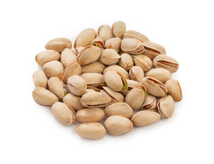Heap pistachios isolated on white background, close up.
