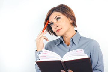 Business lady with a red pen and documents in her hands on a white background.