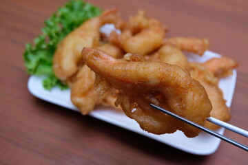 batter-fried prawns on white plate