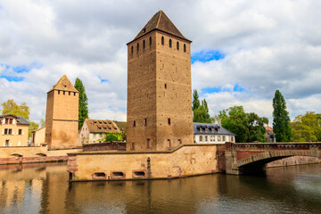 Fototapeta na wymiar View on medieval bridge Ponts Couverts over the River Ill in Strasbourg, Alsace, France