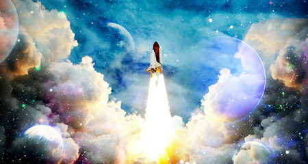Shuttle launch in the clouds to outer space. Dark space with stars on background.Spaceship flight. Elements of this image furnished by NASA