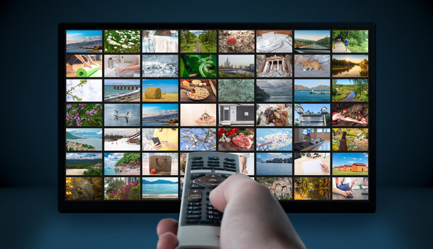 Multimedia Television Video Streaming, Media TV On Demand. Subscription Streaming Video. Internet Streaming Service Concept. Man Hand Holding TV Remote Control.