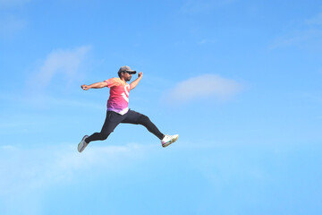 Fototapeta na wymiar person jumping. person jumping in the air