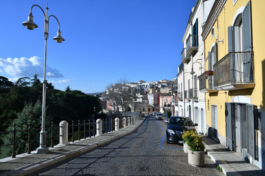 A narrow street among the old houses of Melfi, a village in the province of Potenza in Italy.