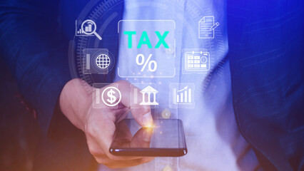 Business using smart phone to complete Individual income tax return form online for tax payment....