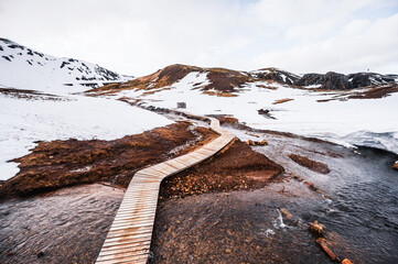 Reykjadalur hot spring thermal river in southwest winter Iceland