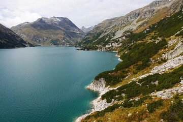 Obraz premium Speicher Kölnbrein in den Hohen Tauern im Herbst
