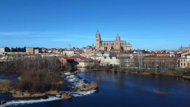View of the Salamanca cathedral reflected in the Tormes river
