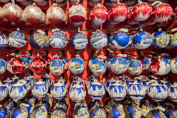Shelves full of Christmas balls with different motifs on New York City