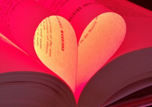 Red heart made from pages of a romance novel