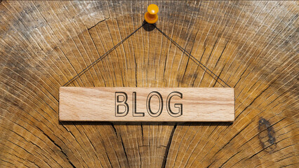 Blog written on wooden surface. Wooden Concept