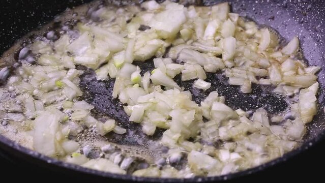 Fry finely chopped onion in oil until translucent