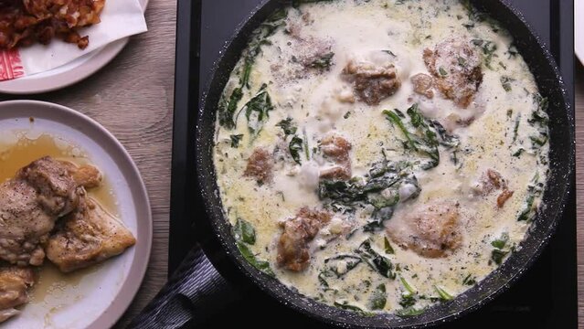 Creamy sauce with white spinach with meat