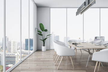 Side view on stylish conference room interior design area with light furniture on wooden floor, green plant on background and city skyline view through panoramic windows. 3D rendering