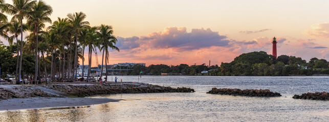 View to the Jupiter lighthouse on the north side of the Jupiter Inlet at sunset.