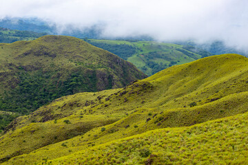 panorama of Costa Rica's cerro pelado mountains during cloudy, foggy weather; dark mountains in Costa Rica, Costa Rican rainforests