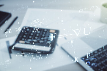 Scientific formula hologram on calculator and pc background, research concept. Multiexposure