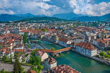 Fototapeta na wymiar City of Luzern panoramic aerial view. Alps and lake Luzern on background. Switzerland.