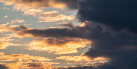 Fototapeta na wymiar Beautiful orange bright sunset sky with clouds. Sunset sky background.