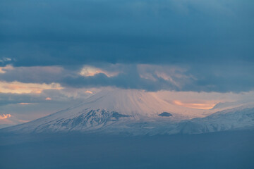Naklejka na ściany i meble Beautiful snow covered Ararat mountain at the sunset.