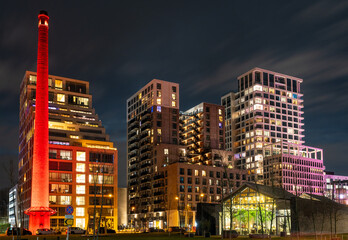 Eindhoven Strijp S district at night, modern buildings at the former industrial terrain