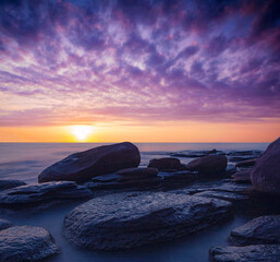 Fototapeta na wymiar Sunrise over the sea on the coast of Cambodia