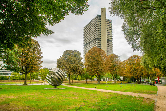 Sign of Doiche Welle amd building of DW behind and amazing park in September