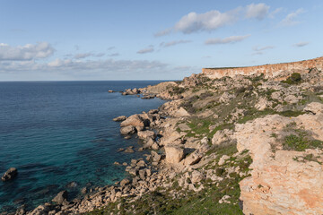 Fototapeta na wymiar The beautiful landscape in Malta with the sea, rocks and the cliffs. 