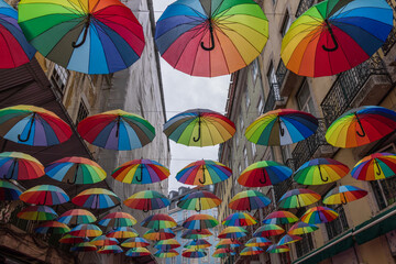 Umbrellas in Pink street in Lisbon, Portugal