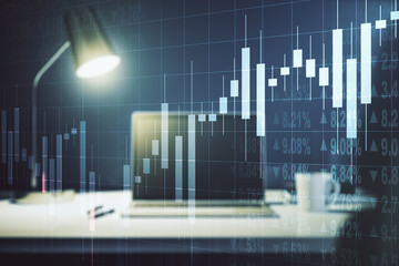 Naklejka premium Double exposure of abstract creative financial chart on modern laptop background, research and strategy concept
