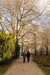 Couple walking in wertheimpark, amsterdam. Autumn season.