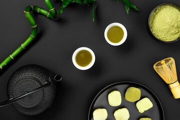 Top view matcha tea cups on black background