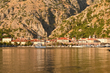 The city of Kotor at the foot of the mountains, Kotor Bay in the sunlight.Montenegro