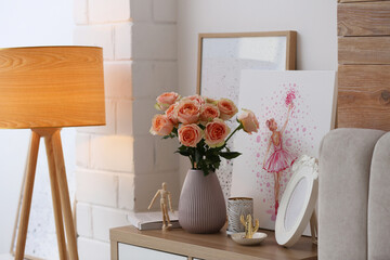 Vase with beautiful flowers in modern room interior