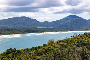 Mocambique beach with forest and mountains