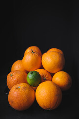 A lemon among oranges. Organic citrus. Individual, different and community concept