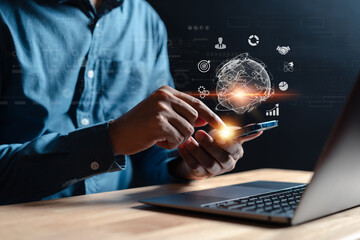 Fototapeta premium Businessman use smartphone management target idea icon which for planning development leadership and customer target group, start up new business concept...