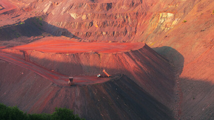 Iron ore quarry landscape with transport