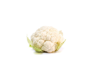 Whole head of fresh white raw cauliflower with leaves close-up on white background. Isolated on white background