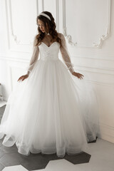 stylish caucasian bride in white wedding dress	