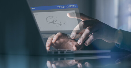 Man hand writing electronic signature on virtual display. Sign contract and business agreement.