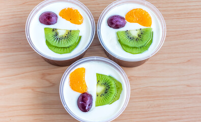 Fruity milk pudding, sweet chocolate silk pudding dessert with fruit topping