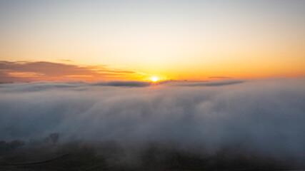 Fototapeta na wymiar Fog and sunrise