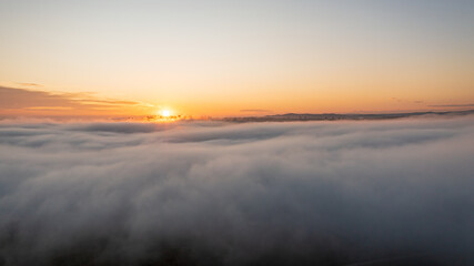Fototapeta na wymiar sunrise in the fog