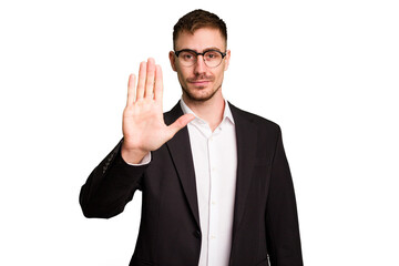 Young caucasian business man cutout isolated standing with outstretched hand showing stop sign, preventing you. - obrazy, fototapety, plakaty