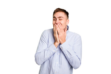 Young caucasian man cut out isolated laughing about something, covering mouth with hands.