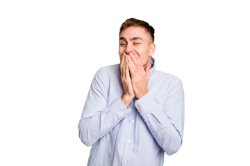 Young caucasian man cut out isolated laughing about something, covering mouth with hands.