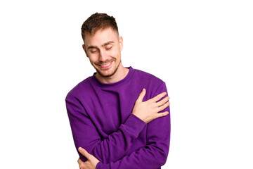 Obraz premium Young caucasian man cut out isolated laughing and having fun.